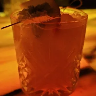 a cocktail in a glass on a table