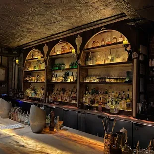 a man standing at a bar