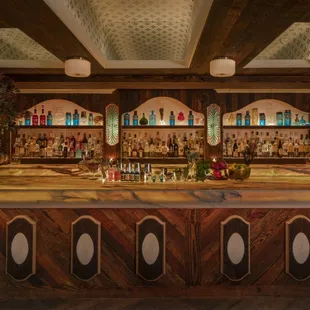 a bar with a wooden bar top