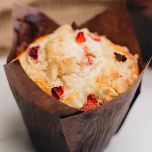 a muffin in a paper wrapper