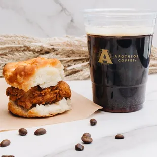 a chicken sandwich and coffee