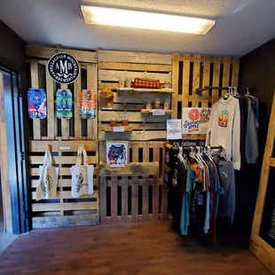 clothing racks and wooden pallets