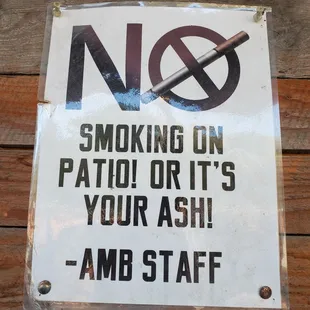 no smoking on patio or it&apos;s your ash