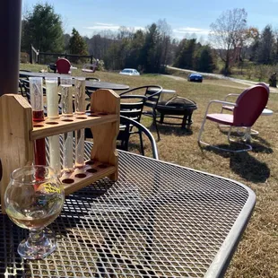 Outside with a flight of Cider.