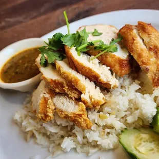 Kaow Mon Gai Tod (crispy chicken over garlic rice and spicy ginger dipping sauce)