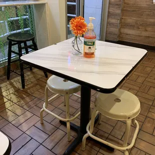 a table with a vase of flowers on it