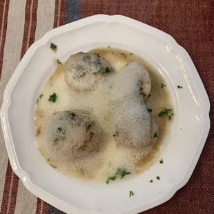 Jumbo seared scallops with a citrusy lemon foam