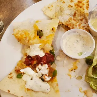 Out of 4 pieces of Hawaiian Chicken Quesadilla I have one left to take home.  Stuffed deliciously.   6/29/2022