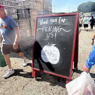 a chalkboard with a thank you for picking list