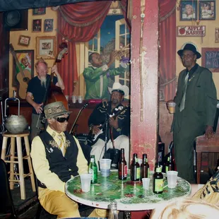 Little Freddy King(seated).Guitar Lightnin Lee(playing),Alabama Slim(standing).