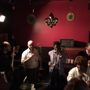 a group of people playing instruments