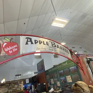 the entrance to an apple bar