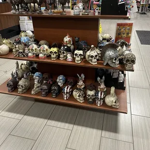 Inside the building are shelves full of nick knacks for purchase. Our granddaughter just loves the day of the dead  items