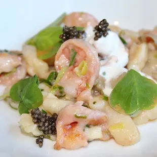 The Potato Gnocchi is made with Florida white shrimp, wild sorrel, crème fraiche, &amp; caviar.