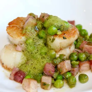 The Bay Scallops are made with sweet pea, ham, bell pepper, &amp; tarragon.