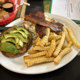 Turkey, bacon and avocado croissant. Fries were seasoned great.