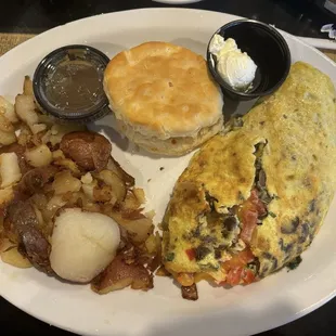 Veggie omelet, potatoes, and biscuit with apple butter