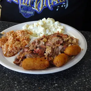 Pork sandwich and pork plate! Yum! By far one of the best BBQ places I've ever eaten at!
