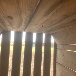 a close up of a wooden bench