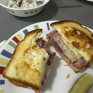 Reuben on gluten free bread with potato salad.