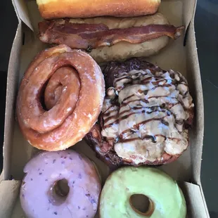 Green tea, power berry, sea salt cinnamon roll, maple chocolate fritter, banana fritter, maple bacon bar and maple custard bar!