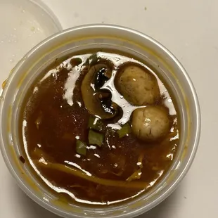 Hot and sour soup with fresh mushrooms