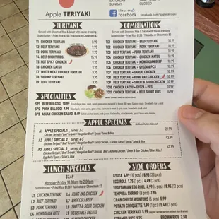 a person holding a menu