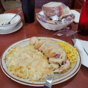 Chicken cordon blue with hashbrowns.