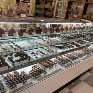 a variety of chocolates in a display case