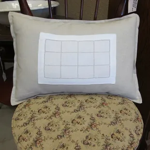 Pillow adorned with antique doily...nice!