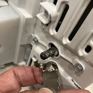 Grinding this off because he didn't know it was a left handed thread