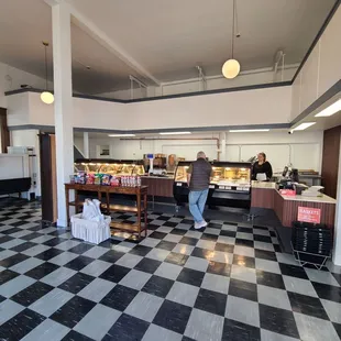 a restaurant with a checkered floor