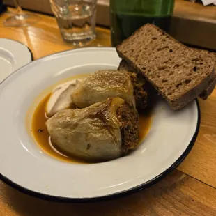 *Fazerowane Papryczi: peppers stuffed with ealnut, onion and bulgar in tomato jus with rye toast