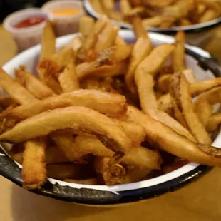 French fries, a little heavy on the finely ground salt. Easy to share this portion. Kudos to whoever staffed the fry station last night.
