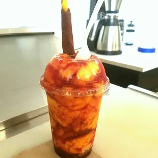 an apple in a cup
