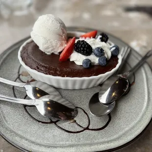 a dessert with ice cream and berries