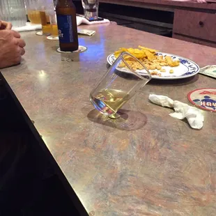 Balancing a glass on a nickel. Wow!