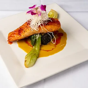 a plate of food on a white table cloth