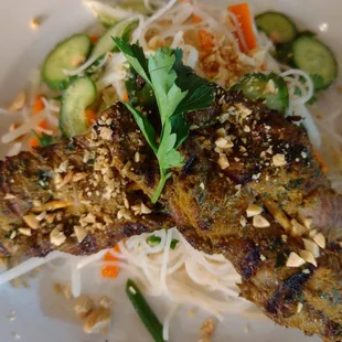 Beef curry skewers with noodle salad