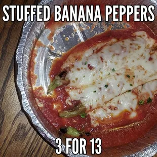 a plate of stuffed banana peppers
