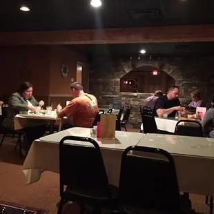 A tad brighter, essentially the same layout.  bar and more booths in back and down the steps. Kitchen in between.
