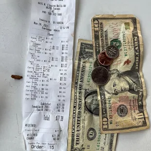 The almost $80 receipt and the $11 refund for the to go order.