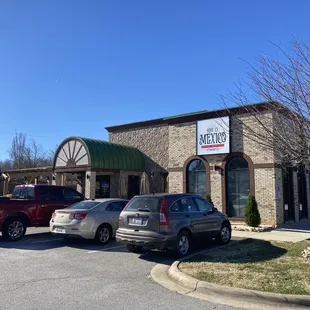 cars parked in front of the building