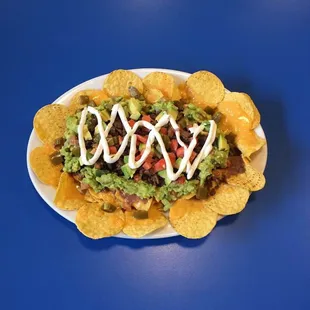 Nachos en Aquino Taqueria