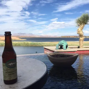 Outside on the patio of Arabesque enjoying a Dogfish Head.