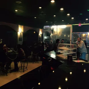a group of people sitting at tables