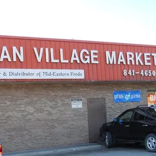 cars parked in front of the store