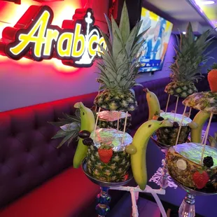 a display of fruits and drinks