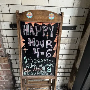 a happy hour sign