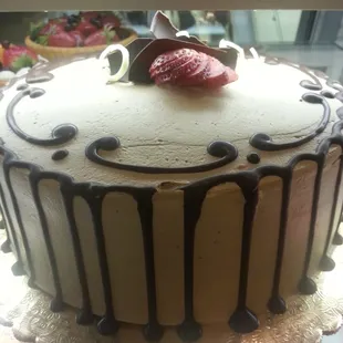a chocolate cake with a strawberry on top